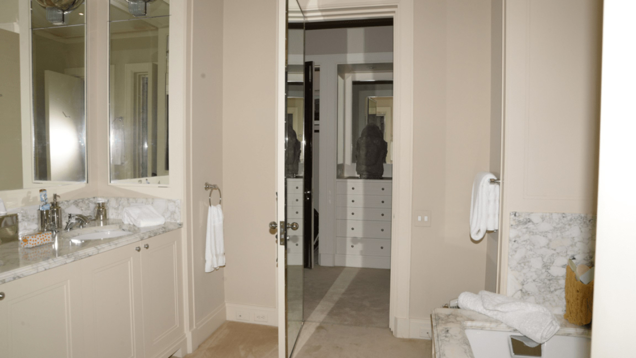 Modern bathroom renovation in Bangalore 2026 with marble vanity and mirror by myNivasa