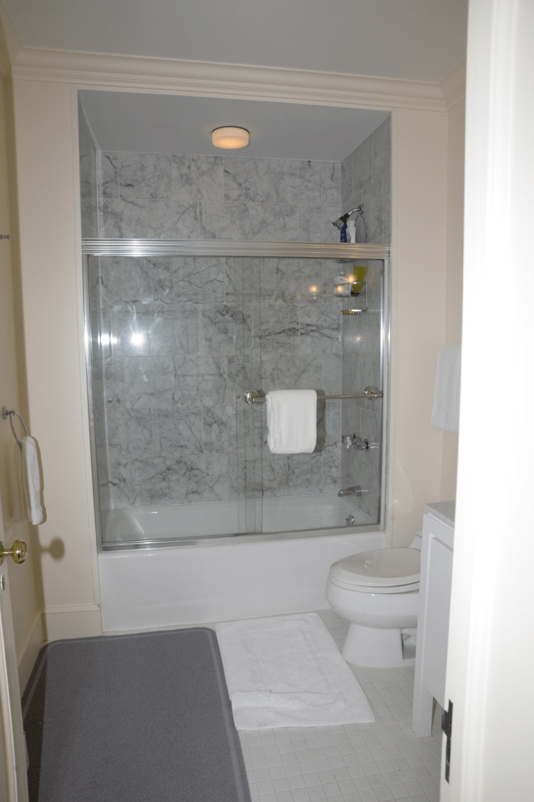 Bathroom tiling and glass shower with waterproofing in Bangalore 2026 by myNivasa