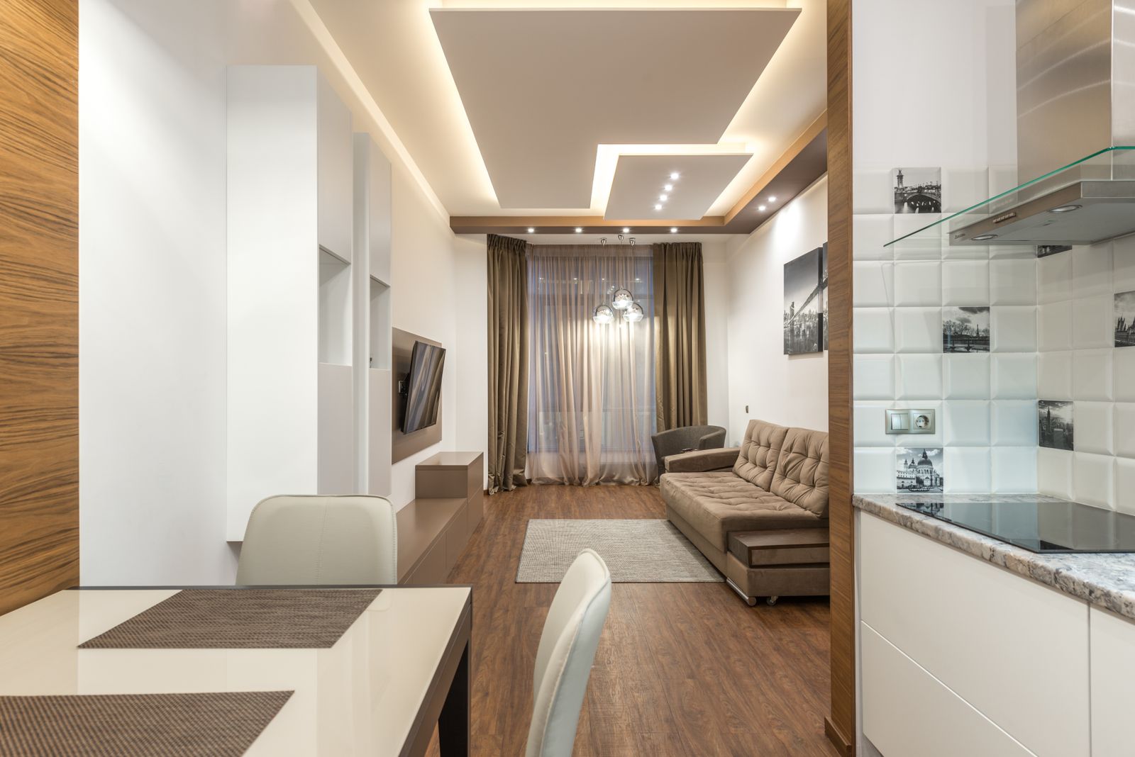 Layered gypsum false ceiling with cove and recessed lights in a Bangalore apartment 2026 by myNivasa