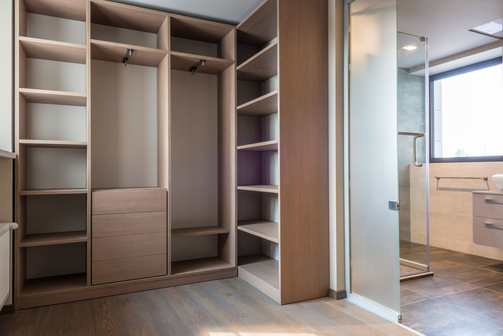 Built in wardrobe with open shelves and drawer stack in a Bengaluru apartment bedroom, 2026, by myNivasa