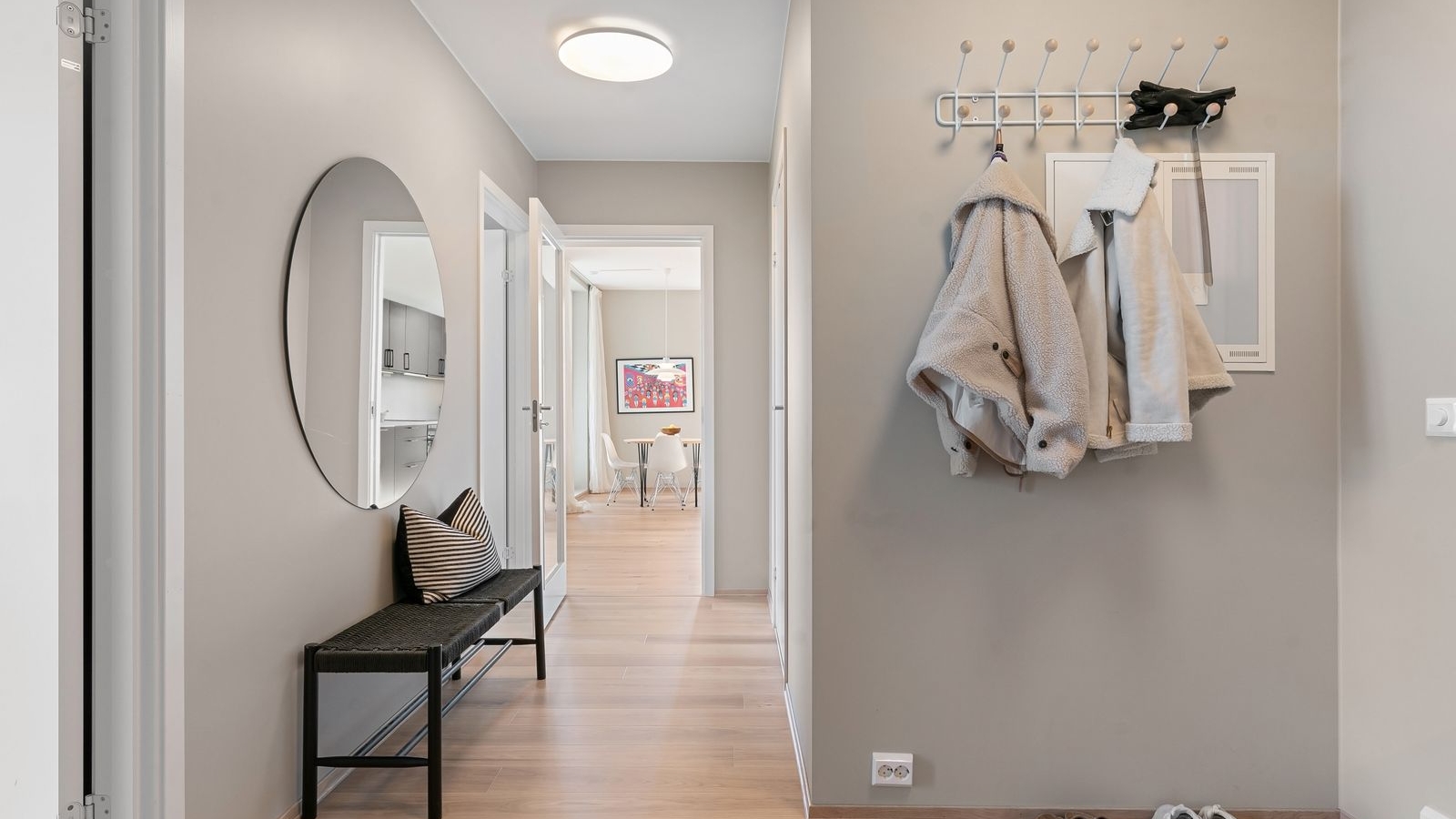 Apartment entrance hallway with a bench, coat hooks and shoes left loose on the floor because there is no built-in shoe cabinet, entrance shoe cabinet cost Bengaluru 2026, by myNivasa