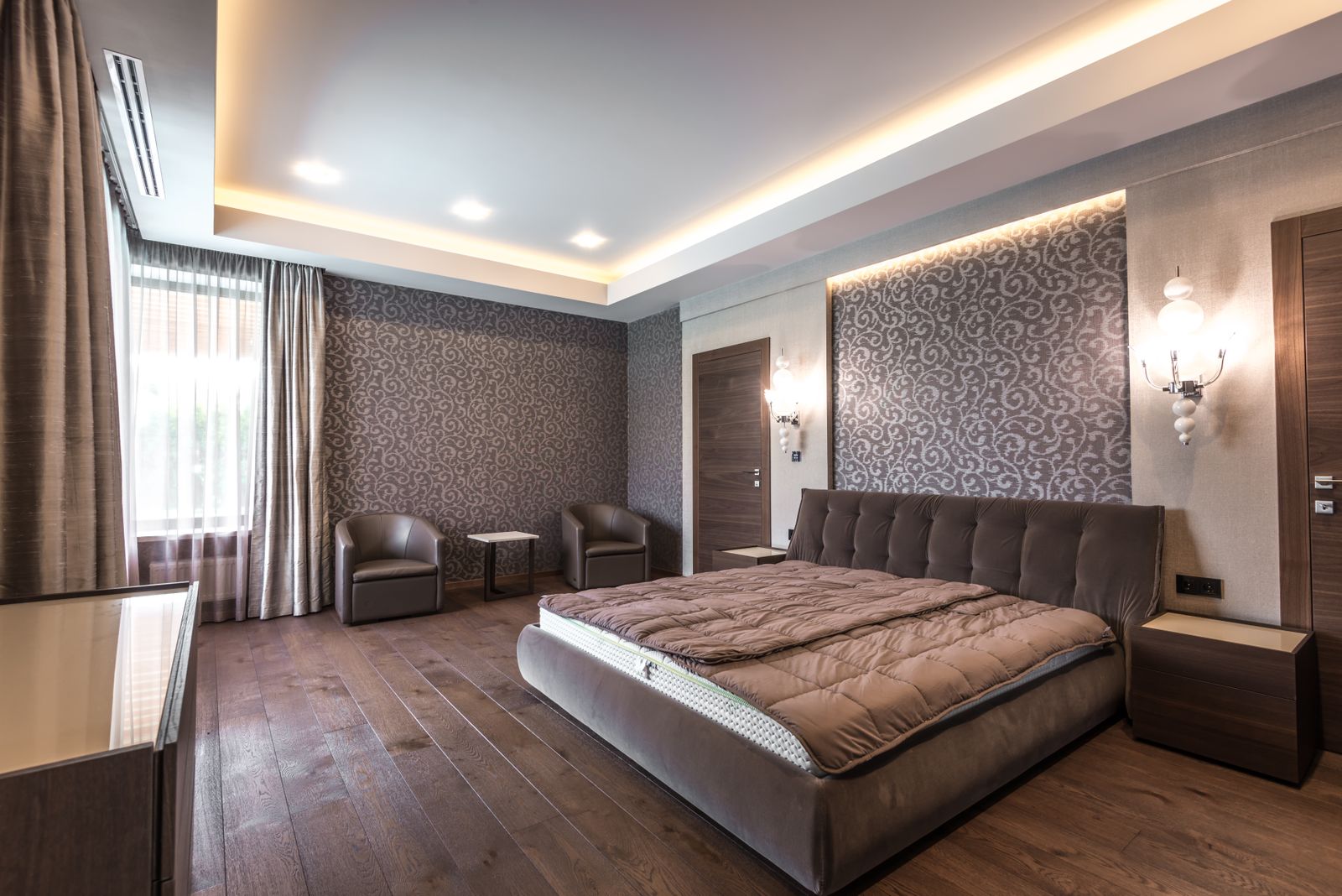 Bengaluru bedroom with a full peripheral cove lit false ceiling, recessed spotlights and an air conditioning grille at the window wall, 2026, by myNivasa