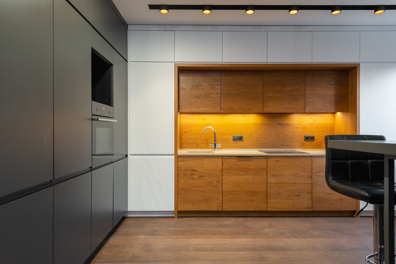 Full height kitchen tall unit run with integrated oven in a modern apartment kitchen, kitchen tall unit cost Bengaluru 2026, by myNivasa