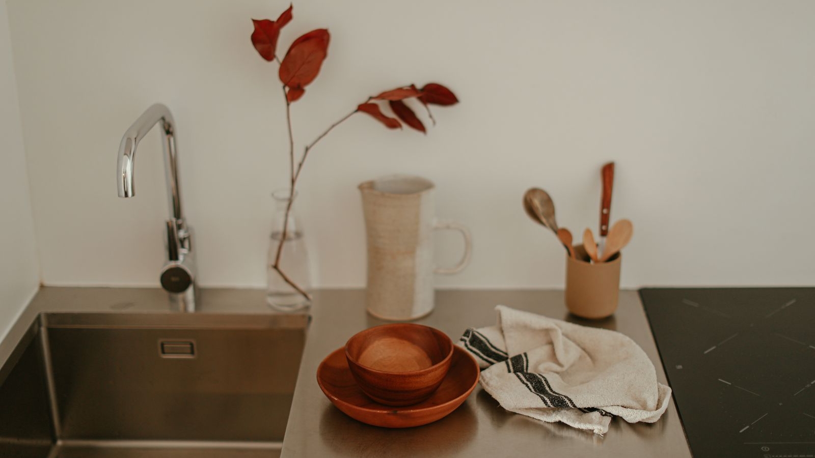 Undermount stainless steel kitchen sink in a modern Bengaluru apartment kitchen counter, 2026, by myNivasa