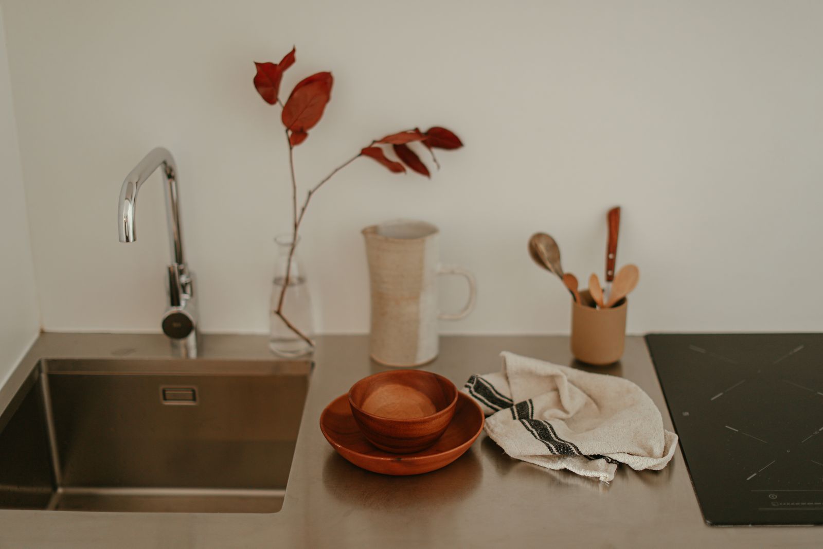 Undermount stainless steel kitchen sink in a modern Bengaluru apartment kitchen counter, 2026, by myNivasa
