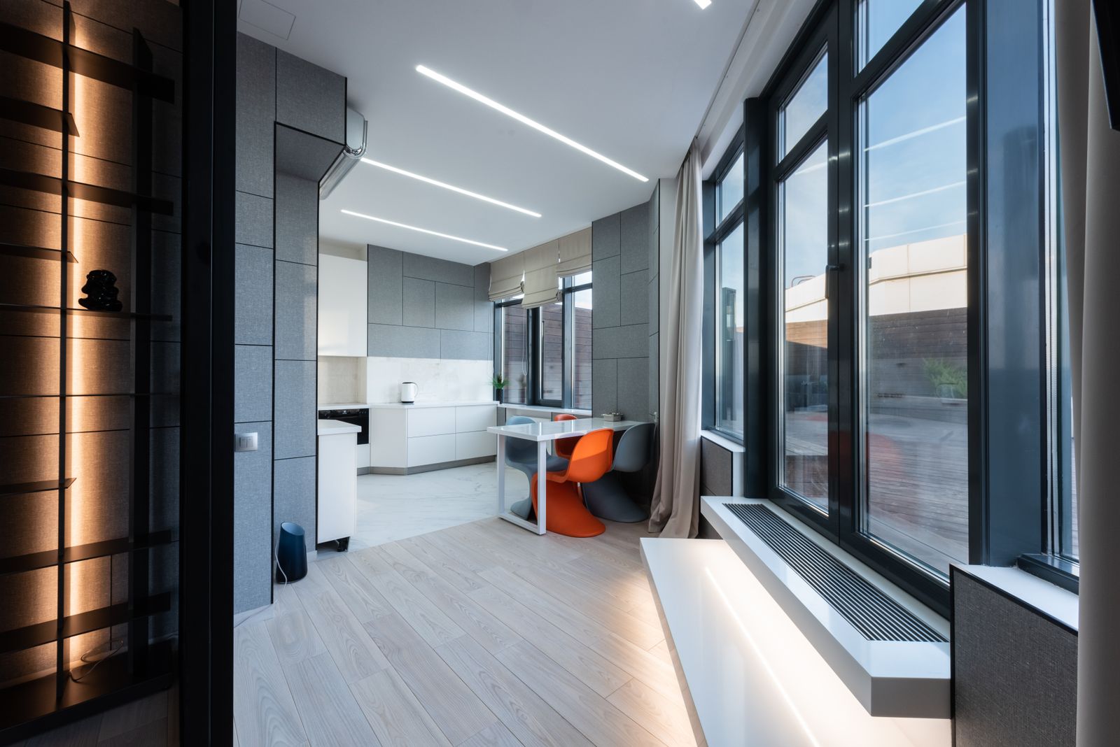Dark framed apartment windows with a deep sill showing frame and glazing detail, Bengaluru 2026, by myNivasa