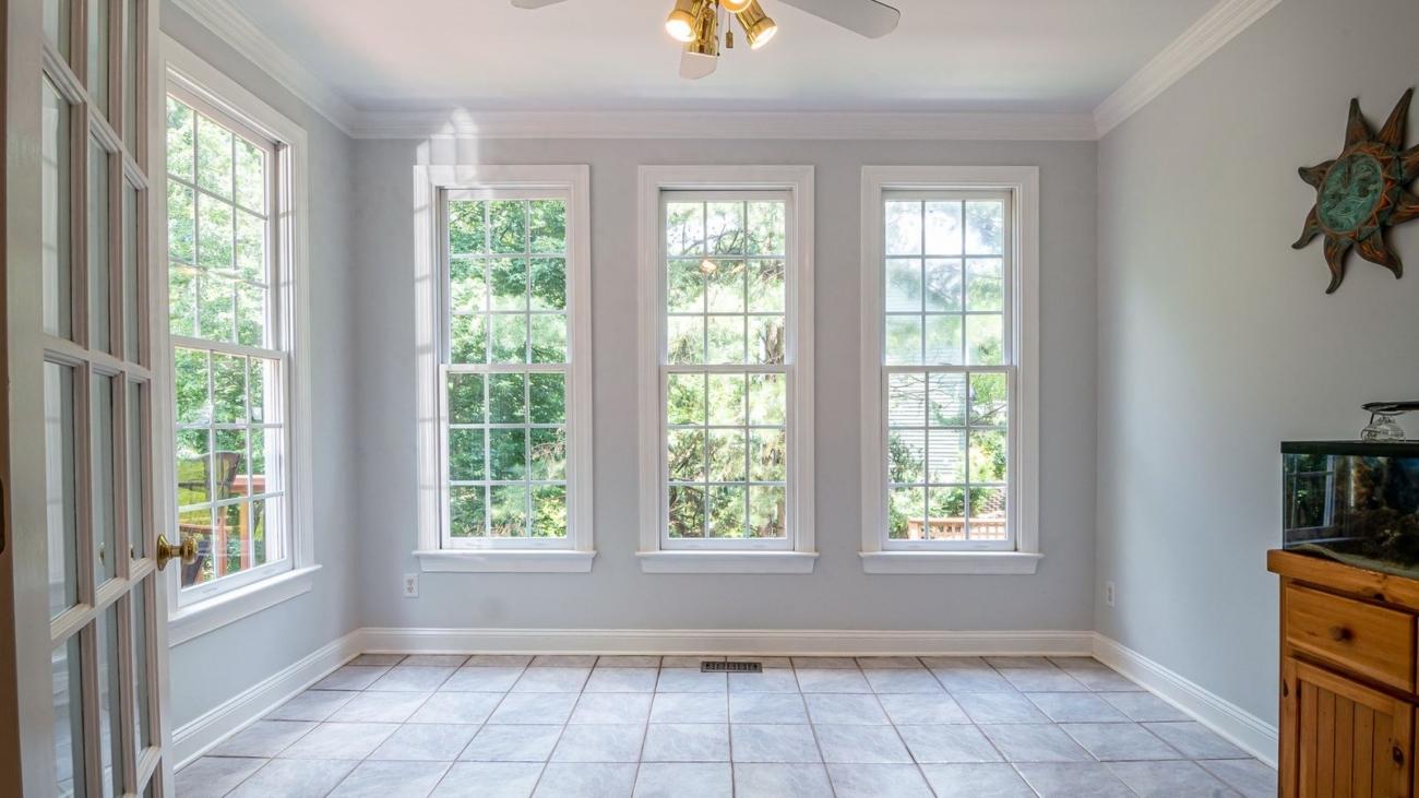Bright Bengaluru room with new light grey vitrified tile floor and white skirting, 2026, by myNivasa